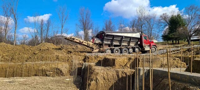 Advanced-Concrete-Construction-Trucking-1024x461